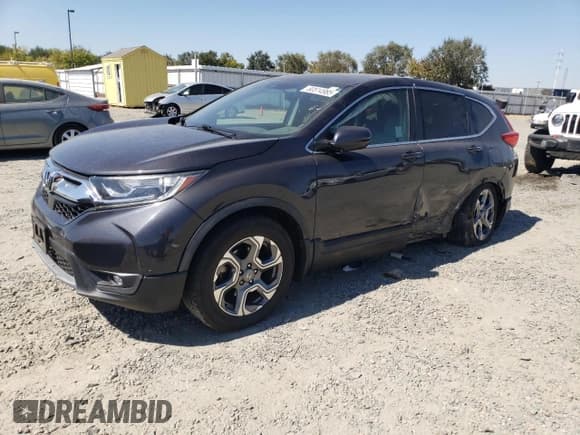 ✅ 2017 Honda CR-V EX • VIN: 2HKRW2H54HH688732 • Лот: 80514985. Опубликован ранее на Copart с пробегом 98 737 миль. Бесплатный доступ к архиву аукционных продаж из США и подробный отчёт об истории автомобиля на DreamBid. Изображение 1.
