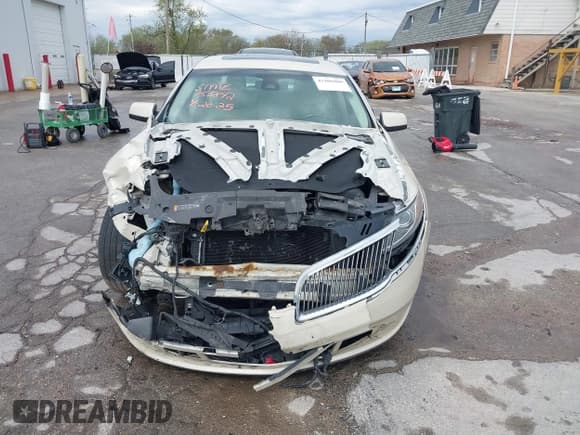 ✅ 2014 Lincoln MKS • VIN: 1LNHL9EK7EG602882 • Lot: 42106909. Listed on IAAI with 186,446 mi. Free auction sales archive from the USA and detailed vehicle history report at DreamBid. Image 12.