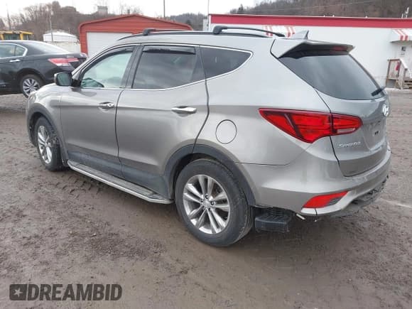 ✅ 2018 Hyundai Santa Fe Limited • VIN: 5XYZUDLA3JG536959 • Лот: 41648966. Опубликован ранее на IAAI с пробегом 72 563 миль. Бесплатный доступ к архиву аукционных продаж из США и подробный отчёт об истории автомобиля на DreamBid. Изображение 3.