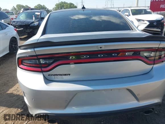 ✅ 2023 Dodge Charger Scat Pack Widebody • VIN: 2C3CDXGJ9PH699759 • Lot: 42824220. Listed on IAAI with 3,338 mi. Free auction sales archive from the USA and detailed vehicle history report at DreamBid. Image 17.