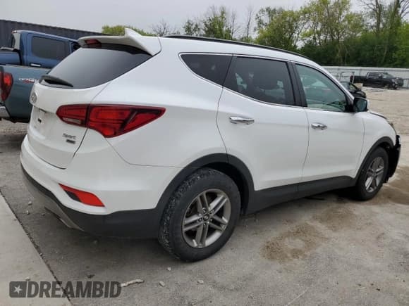 ✅ 2017 Hyundai Santa Fe 2.4L • VIN: 5XYZUDLB4HG418390 • Лот: 55275014. Опубликован ранее на Copart с пробегом 69 981 миль. Бесплатный доступ к архиву аукционных продаж из США и подробный отчёт об истории автомобиля на DreamBid. Изображение 3.