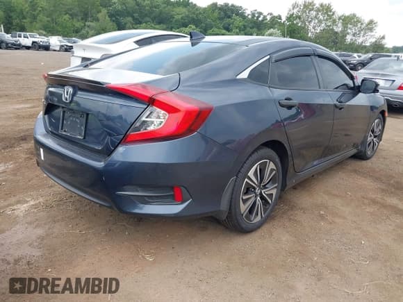 ✅ 2018 Honda Civic EX-T • VIN: JHMFC1F34JX037438 • Lot: 42887459. Listed on IAAI with 107,302 mi. Free auction sales archive from the USA and detailed vehicle history report at DreamBid. Image 4.