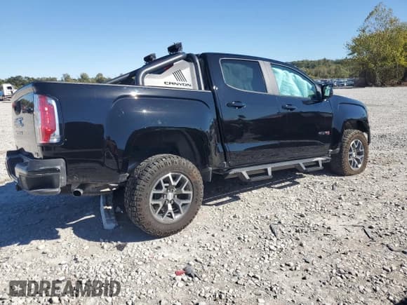 ✅ 2022 GMC Canyon 4WD AT4 • VIN: 1GTG6FEN9N1215706 • Lot: 87415805. Listed on Copart with Not provided. Free auction sales archive from the USA and detailed vehicle history report at DreamBid. Image 3.