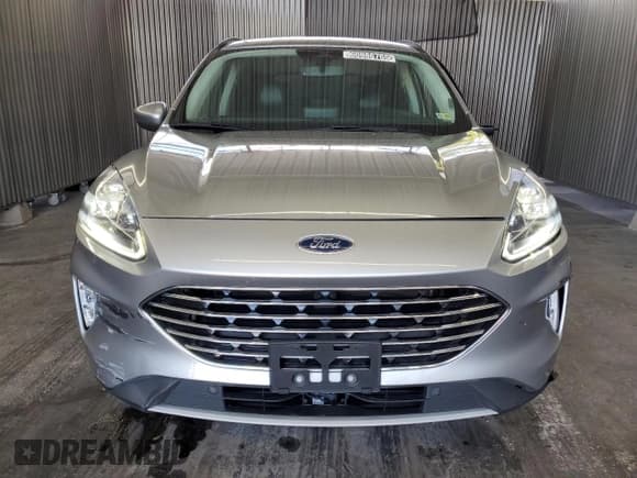 ✅ 2021 Ford Escape Titanium Plug-In Hybrid • VIN: 1FMCU0LZ8MUA66995 • Lot: 60986765. Listed on Copart with 69,609 mi. Free auction sales archive from the USA and detailed vehicle history report at DreamBid. Image 5.