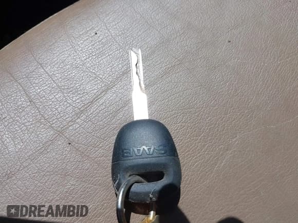 ✅ 1999 Saab 9-3 • VIN: YS3DF58N6X2075029 • Lot: 42157737. Wystawiony na IAAI z przebiegiem 207 803 mil. Bezpłatny archiwum sprzedaży aukcyjnych z USA i szczegółowy raport historii pojazdu na DreamBid. Zdjęcie 11.