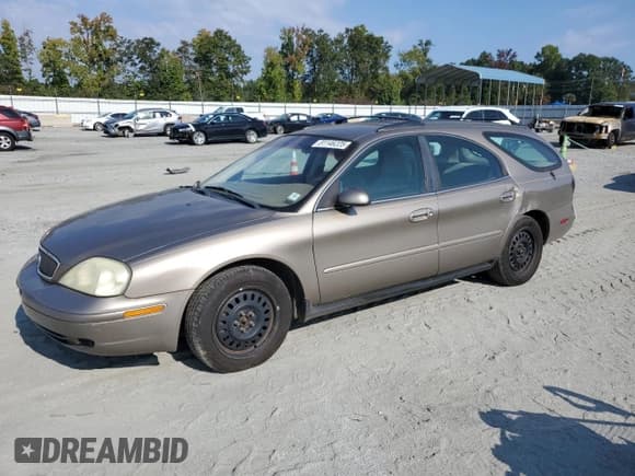 ✅ 2003 Mercury Sable GS • VIN: 1MEFM58U33A600317 • Lot: 81146225. Listed on Copart with 193,006 mi. Free auction sales archive from the USA and detailed vehicle history report at DreamBid. Image 1.