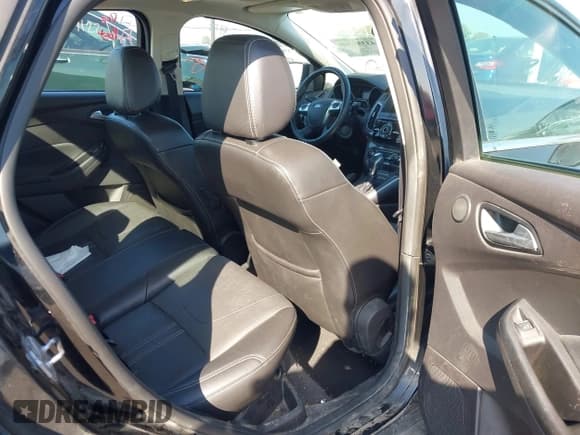 ✅ 2014 Ford Focus Titanium • VIN: 1FADP3J23EL237429 • Lot: 43358765. Listed on IAAI with 138,960 mi. Free auction sales archive from the USA and detailed vehicle history report at DreamBid. Image 8.