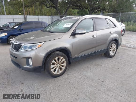 ✅ 2014 Kia Sorento EX • VIN: 5XYKUDA7XEG541655 • Lot: 43336992. Listed on IAAI with 263,774 mi. Free auction sales archive from the USA and detailed vehicle history report at DreamBid. Image 2.