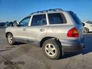 ✅ 2003 Hyundai Santa Fe GLS • VIN: KM8SC13E13U460984 • Lot: 87202585. Wystawiony na Copart z przebiegiem 96 517 mil. Bezpłatny archiwum sprzedaży aukcyjnych z USA i szczegółowy raport historii pojazdu na DreamBid. Zdjęcie 2.