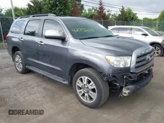 ✅ 2014 Toyota Sequoia Platinum • VIN: 5TDDY5G14ES093700 • Lot: 42736230. Wystawiony na IAAI z przebiegiem 200 403 mil. Bezpłatny archiwum sprzedaży aukcyjnych z USA i szczegółowy raport historii pojazdu na DreamBid. Zdjęcie 1.