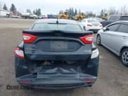 ✅ 2014 Ford Fusion S Hybrid • VIN: 3FA6P0UU2ER151437 • Лот: 41647940. Опубликован ранее на IAAI с пробегом 145 848 миль. Бесплатный доступ к архиву аукционных продаж из США и подробный отчёт об истории автомобиля на DreamBid. Изображение 6.