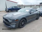 ✅ 2021 Ford Mustang EcoBoost • VIN: 1FA6P8TH9M5157062 • Lot: 42377957. Listed on IAAI with 25,997 mi. Free auction sales archive from the USA and detailed vehicle history report at DreamBid. Image 2.