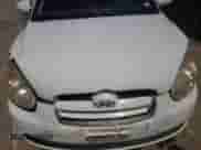 2007 Hyundai Accent GS with VIN KMHCM36C27U030166, listed as a Copart auction lot 67738154 with 174,856 mi miles and Salvage title. Bid and sale history available at DreamBid. Image 11.