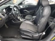 ✅ 2014 Hyundai Veloster RE:FLEX • VIN: KMHTC6AD2EU216453 • Lot: 87090324. Wystawiony na Copart z przebiegiem 147 771 mil. Bezpłatny archiwum sprzedaży aukcyjnych z USA i szczegółowy raport historii pojazdu na DreamBid. Zdjęcie 7.