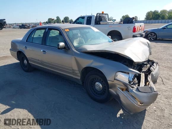 ✅ 2001 Ford Crown Victoria • VIN: 2FAFP73W01X131209 • Lot: 43033250. Listed on IAAI with 241,898 mi. Free auction sales archive from the USA and detailed vehicle history report at DreamBid. Image 1.