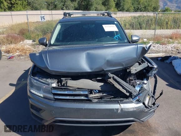 ✅ 2019 Volkswagen Tiguan SE • VIN: 3VV2B7AX5KM201062 • Lot: 43316542. Listed on IAAI with 87,758 mi. Free auction sales archive from the USA and detailed vehicle history report at DreamBid. Image 12.