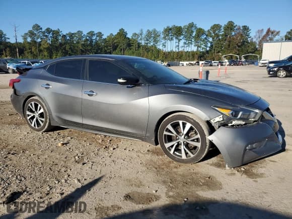 ✅ 2016 Nissan Maxima SV • VIN: 1N4AA6AP9GC448817 • Lot: 90627405. Listed on Copart with 174,488 mi. Free auction sales archive from the USA and detailed vehicle history report at DreamBid. Image 4.