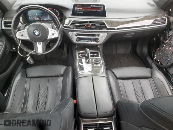 ✅ 2022 BMW 7 Series 750i xDrive • VIN: WBA7U2C01NCK70139 • Lot: 61612135. Wystawiony na Copart z przebiegiem 91 629 mil. Bezpłatny archiwum sprzedaży aukcyjnych z USA i szczegółowy raport historii pojazdu na DreamBid. Zdjęcie 8.
