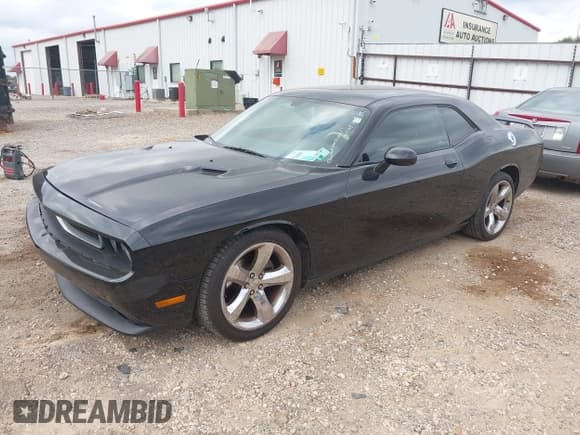 ✅ 2013 Dodge Challenger SXT • VIN: 2C3CDYAG3DH530898 • Lot: 43736090. Listed on IAAI with 184,353 mi. Free auction sales archive from the USA and detailed vehicle history report at DreamBid. Image 22.