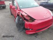 ✅ 2023 Tesla Model Y Long Range • VIN: 7SAYGAEE5PF685474 • Lot: 40348773. Wystawiony na IAAI z przebiegiem 26 605 mil. Bezpłatny archiwum sprzedaży aukcyjnych z USA i szczegółowy raport historii pojazdu na DreamBid. Zdjęcie 6.