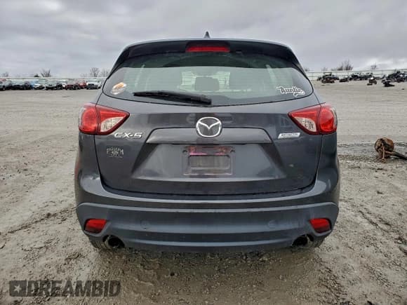 ✅ 2015 Mazda CX-5 Sport • VIN: JM3KE2BE0F0502750 • Lot: 93753425. Listed on Copart with 101,312 mi. Free auction sales archive from the USA and detailed vehicle history report at DreamBid. Image 6.