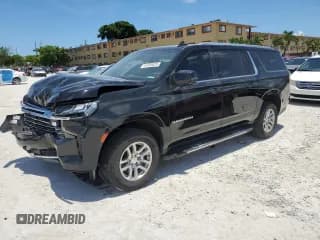 ✅ 2023 Chevrolet Suburban LT • VIN: 1GNSCCKD5PR148949 • Lot: 61658625. Wystawiony na Copart z przebiegiem 103 447 mil. Bezpłatny archiwum sprzedaży aukcyjnych z USA i szczegółowy raport historii pojazdu na DreamBid. Zdjęcie 1.