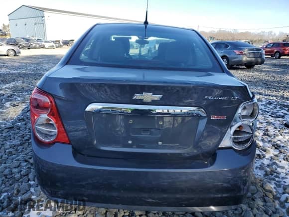 2012 Chevrolet Sonic LT with VIN 1G1JC5SB3C4225574, listed as a Copart auction lot 87488444 with 110,659 mi miles and Salvage title. Bid and sale history available at DreamBid. Image 6.