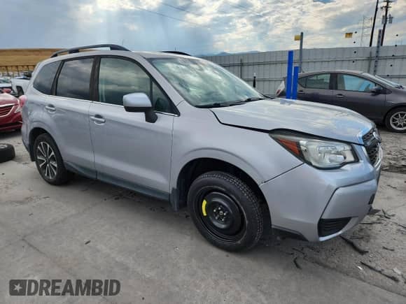 2017 Subaru Forester Premium with VIN JF2SJGEC7HH546326, listed as a Copart auction lot 69996965 with 31,562 mi miles and Salvage title. Bid and sale history available at DreamBid. Image 4.