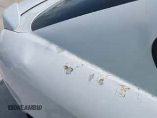 2003 Hyundai Tiburon GT z VIN KMHHN65FX3U036095, wystawiony jako IAAI lot #41895465 z przebiegiem 179 838 mil mil oraz . Historia ofert i sprzedaży dostępna na DreamBid. Obrazek 6.