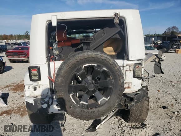 ✅ 2007 Jeep Wrangler Unlimited Sahara • VIN: 1J4GB59117L143155 • Lot: 92919195. Listed on Copart with Not provided. Free auction sales archive from the USA and detailed vehicle history report at DreamBid. Image 6.