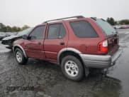 ✅ 2002 Isuzu Rodeo S • VIN: 4S2CK58W624326351 • Lot: 80101064. Listed on Copart with 210,782 mi. Free auction sales archive from the USA and detailed vehicle history report at DreamBid. Image 2.