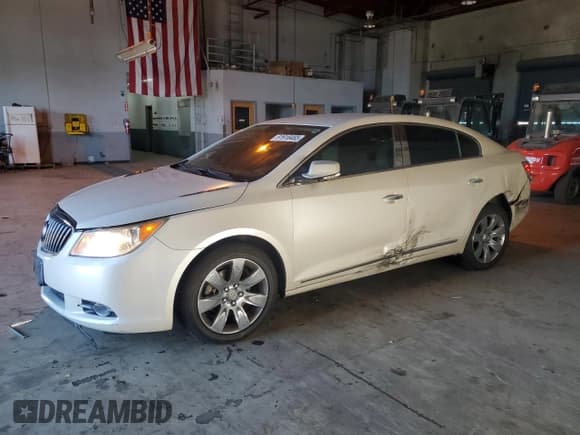 ✅ 2013 Buick LaCrosse Leather • VIN: 1G4GC5E34DF335265 • Лот: 91918465. Опубликован ранее на Copart с пробегом 150 337 миль. Бесплатный доступ к архиву аукционных продаж из США и подробный отчёт об истории автомобиля на DreamBid. Изображение 1.