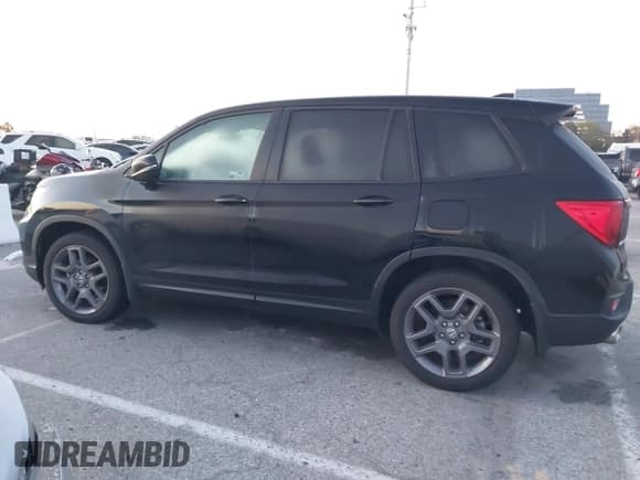 ✅ 2022 Honda Passport EX-L • VIN: 5FNYF7H53NB005762 • Lot: 41824602. Listed on IAAI with 28,104 mi. Free auction sales archive from the USA and detailed vehicle history report at DreamBid. Image 14.