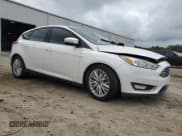 ✅ 2016 Ford Focus Titanium • VIN: 1FADP3N27GL242243 • Лот: 90424575. Опубликован ранее на Copart с пробегом 58 813 миль. Бесплатный доступ к архиву аукционных продаж из США и подробный отчёт об истории автомобиля на DreamBid. Изображение 4.