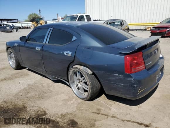 2007 Dodge Charger with VIN 2B3KA43R67H797756, listed as a Copart auction lot 58540464 with 188,934 mi miles and Salvage title. Bid and sale history available at DreamBid. Image 2.