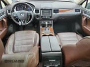 ✅ 2014 Volkswagen Touareg Sport • VIN: WVGEF9BP0ED010980 • Lot: 71523235. Listed on Copart with 107,764 mi. Free auction sales archive from the USA and detailed vehicle history report at DreamBid. Image 8.