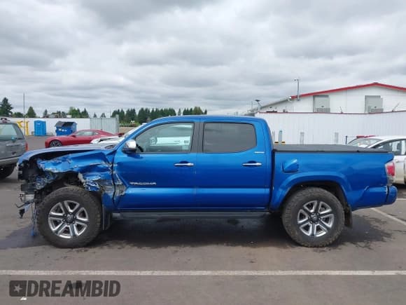 ✅ 2016 Toyota Tacoma Limited • VIN: 3TMGZ5AN1GM030563 • Lot: 42577215. Listed on IAAI with 100,917 mi. Free auction sales archive from the USA and detailed vehicle history report at DreamBid. Image 14.