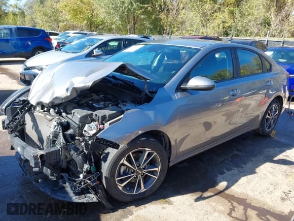 ✅ 2023 Kia Forte LXS • VIN: 3KPF24AD6PE685670 • Lot: 43520081. Listed on IAAI with 38,544 mi. Free auction sales archive from the USA and detailed vehicle history report at DreamBid. Image 2.
