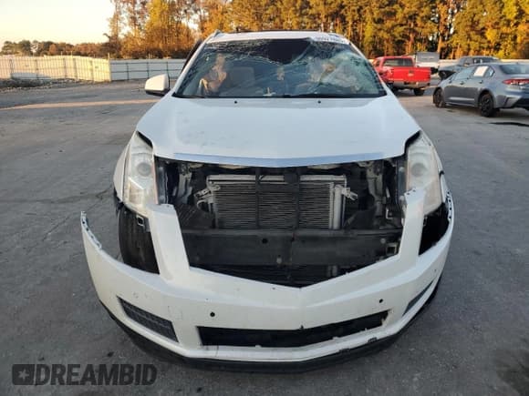 ✅ 2010 Cadillac SRX Luxury Collection • VIN: 3GYFNAEY8AS606392 • Lot: 90927885. Wystawiony na Copart z przebiegiem 263 544 mil. Bezpłatny archiwum sprzedaży aukcyjnych z USA i szczegółowy raport historii pojazdu na DreamBid. Zdjęcie 5.