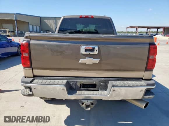 2015 Chevrolet Silverado 2500HD LTZ с VIN 1GC1KWE84FF104240, выставлен на аукционе Copart как лот 84268505 с пробегом 361 305 миль миль и Списание • Salvage title. История ставок и продаж доступна на DreamBid. Изображение 6.