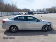 ✅ 2014 Volkswagen Jetta TDI w/Premium/Nav • VIN: 3VWLL7AJ3EM332617 • Lot: 42033000. Listed on IAAI with 186,444 mi. Free auction sales archive from the USA and detailed vehicle history report at DreamBid. Image 13.