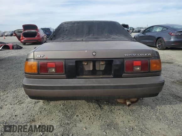 ✅ 1986 Toyota Celica • VIN: JT2ST64C2G7027377 • Lot: 47088125. Wystawiony na Copart z przebiegiem 724 249 mil. Bezpłatny archiwum sprzedaży aukcyjnych z USA i szczegółowy raport historii pojazdu na DreamBid. Zdjęcie 6.