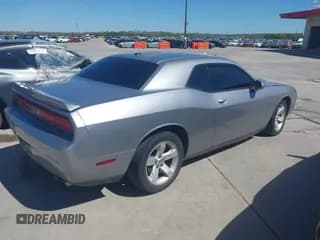 ✅ 2013 Dodge Challenger SXT • VIN: 2C3CDYAGXDH674836 • Lot: 41867502. Wystawiony na IAAI z przebiegiem 231 992 mil. Bezpłatny archiwum sprzedaży aukcyjnych z USA i szczegółowy raport historii pojazdu na DreamBid. Zdjęcie 4.
