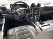 ✅ 2003 Hummer H2 • VIN: 5GRGN23U73H111109 • Lot: 76388144. Listed on Copart with 160,179 mi. Free auction sales archive from the USA and detailed vehicle history report at DreamBid. Image 8.