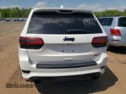 ✅ 2018 Jeep Grand Cherokee • VIN: NJ1449E • Lot: 51357834. Listed on Copart with 32,619 mi. Free auction sales archive from the USA and detailed vehicle history report at DreamBid. Image 6.