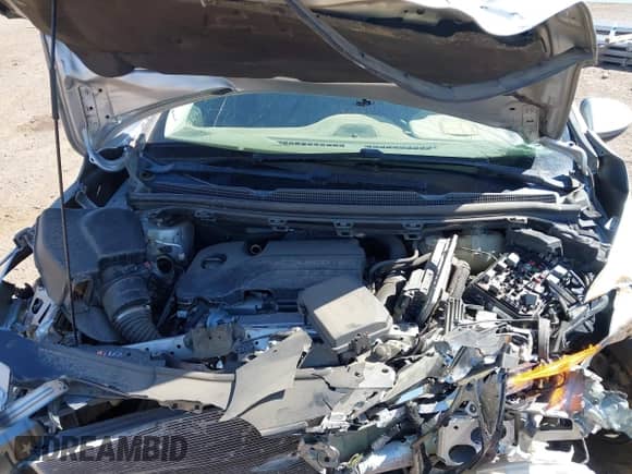 2018 Chevrolet Cruze LS z VIN 1G1BC5SM7J7141792, wystawiony jako IAAI lot #43334627 z przebiegiem 71 152 mil mil oraz . Historia ofert i sprzedaży dostępna na DreamBid. Obrazek 10.