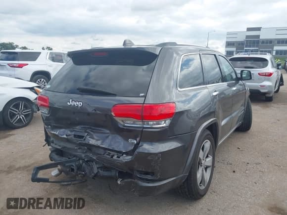 ✅ 2014 Jeep Grand Cherokee Overland • VIN: 1C4RJFCG6EC211600 • Lot: 43289489. Listed on IAAI with 133,935 mi. Free auction sales archive from the USA and detailed vehicle history report at DreamBid. Image 4.