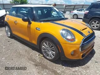 ✅ 2014 MINI Hardtop S • VIN: WMWXM7C5XET731640 • Lot: 42698349. Listed on IAAI with 87,873 mi. Free auction sales archive from the USA and detailed vehicle history report at DreamBid. Image 1.