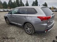 ✅ 2018 Mitsubishi Outlander ES • VIN: JA4AZ3A38JZ052858 • Lot: 94534505. Listed on Copart with 165,083 mi. Free auction sales archive from the USA and detailed vehicle history report at DreamBid. Image 2.