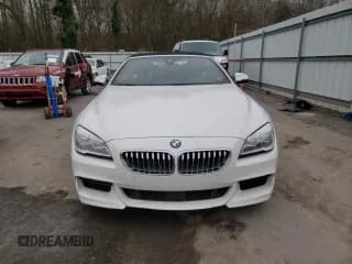 ✅ 2018 BMW 6 Series 650i • VIN: WBA6F5C55JD997243 • Lot: 69576782. Wystawiony na Copart z przebiegiem Nie podano. Bezpłatny archiwum sprzedaży aukcyjnych z USA i szczegółowy raport historii pojazdu na DreamBid. Zdjęcie 5.